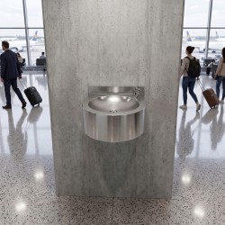 Wall-hung stainless steel drinking fountain with bubbler spout for drinking directly or from a glass