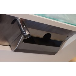 Recessed paper towel dispenser behind mirror in stainless steel