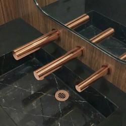 RONDEO designer touch-free soap dispenser in copper PVD with matching tap and hand dryer