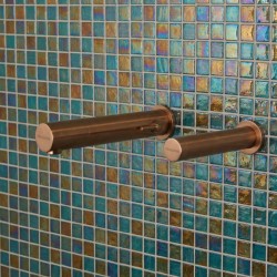 A refined bathroom space, enhanced by copper electronic faucetry A refined bathroom space, enhanced by copper electronic faucetry