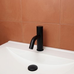 Matte black faucet with concealed motion sensor in the spout tip, ultra-modern design Matte black faucet with concealed motion sensor in the spout tip, ultra-modern design