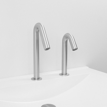 Automatic liquid soap dispensers